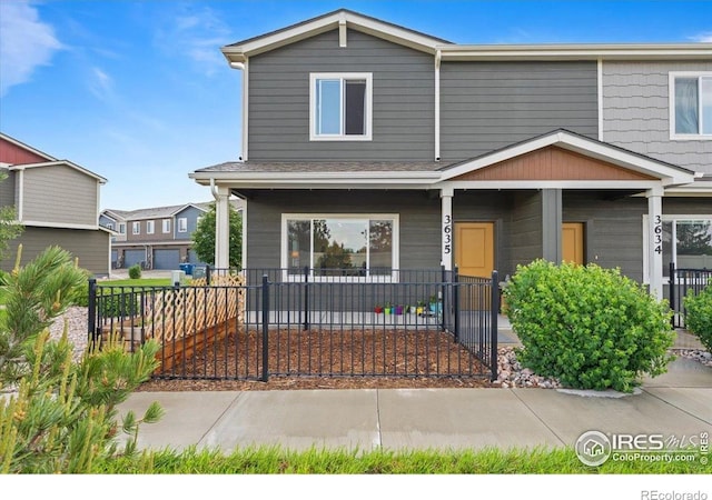 3635 Ronald Reagan Ave, Wellington, CO 80549 - view of front of house with a porch