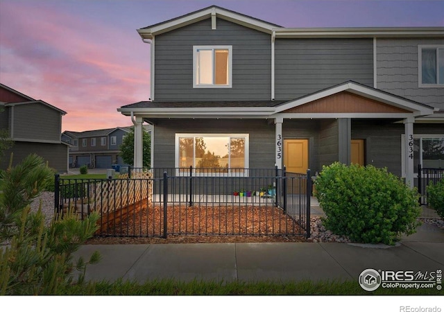 3635 Ronald Reagan Ave, Wellington, CO 80549 - view of front of property featuring a porch