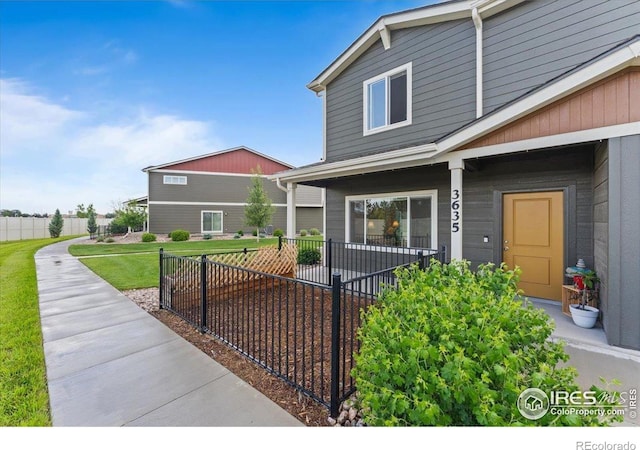 3635 Ronald Reagan Ave, Wellington, CO 80549 - doorway to property featuring covered porch