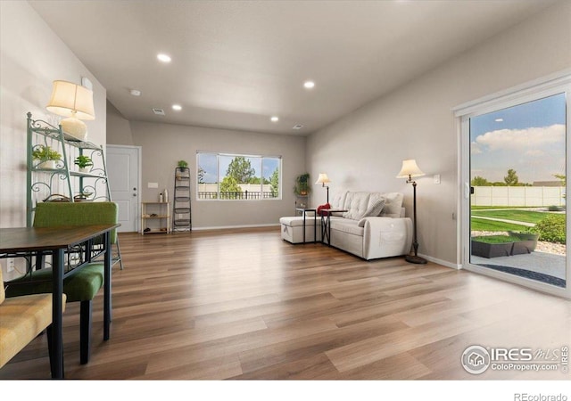 3635 Ronald Reagan Ave, Wellington, CO 80549 - living area with recessed lighting, light wood-style floors, and baseboards