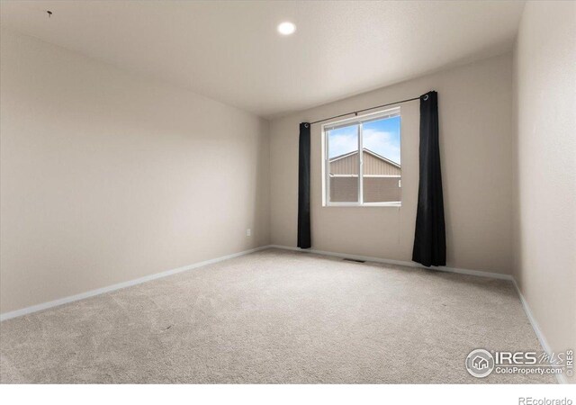 3635 Ronald Reagan Ave, Wellington, CO 80549 - spare room with carpet and baseboards