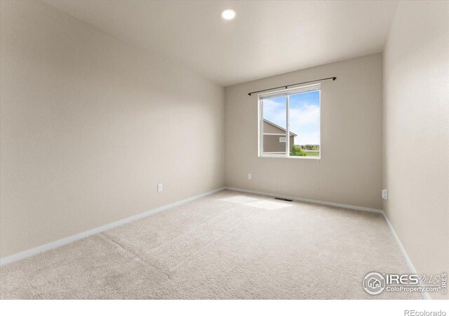 3635 Ronald Reagan Ave, Wellington, CO 80549 - spare room with carpet floors and baseboards