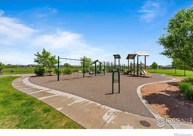 3635 Ronald Reagan Ave, Wellington, CO 80549 - communal playground featuring a yard