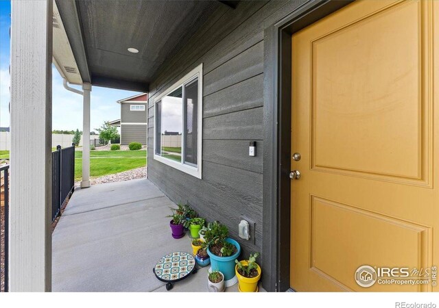 3635 Ronald Reagan Ave, Wellington, CO 80549 - property entrance with covered porch