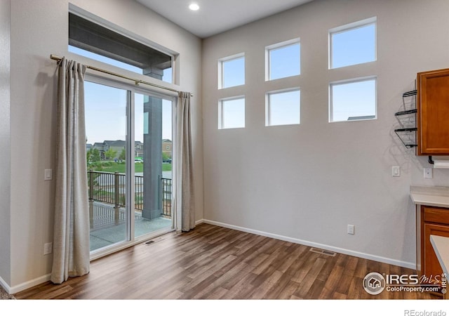 3997 Forest Lake Ct, Loveland, CO 80538 - empty room featuring wood finished floors, baseboards, and recessed lighting