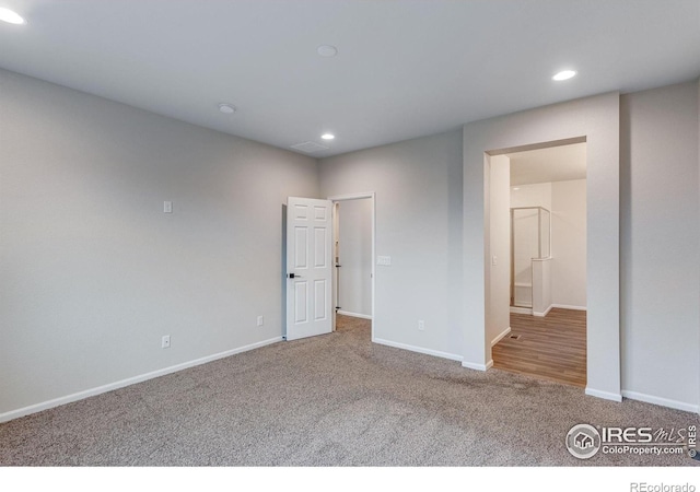 3997 Forest Lake Ct, Loveland, CO 80538 - unfurnished bedroom with carpet, baseboards, and recessed lighting