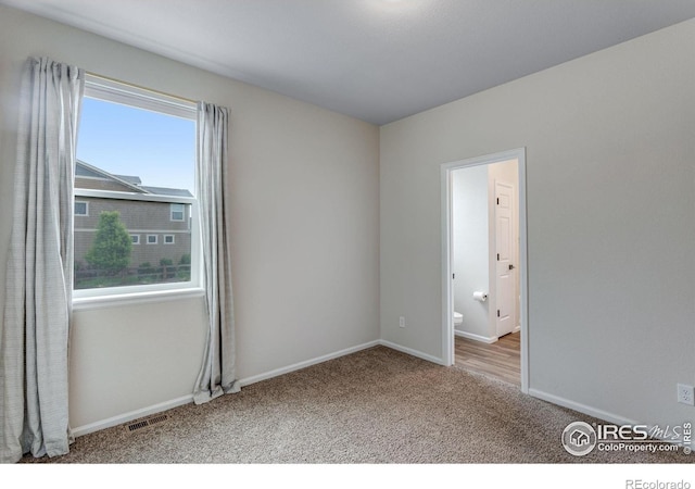 3997 Forest Lake Ct, Loveland, CO 80538 - carpeted empty room with baseboards