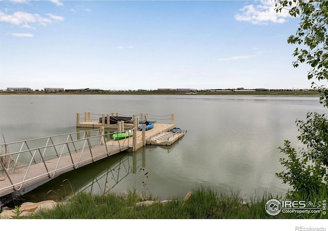 3997 Forest Lake Ct, Loveland, CO 80538 - dock area featuring a water view