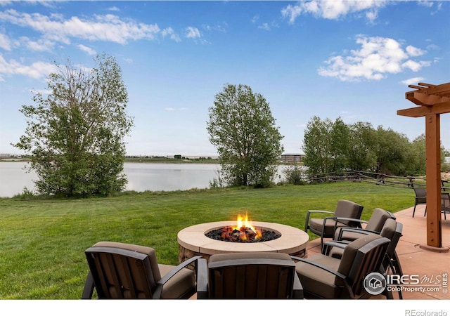 3997 Forest Lake Ct, Loveland, CO 80538 - view of patio / terrace with a fire pit and a water view