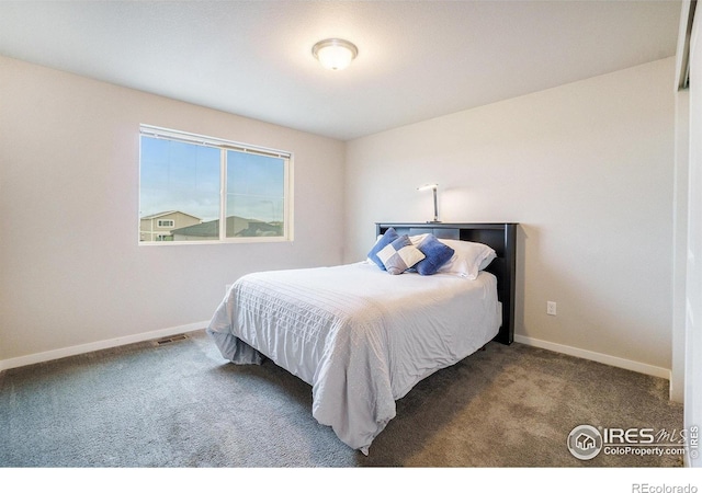 3960 Sweetgum St, Wellington, CO 80549 - carpeted bedroom featuring baseboards