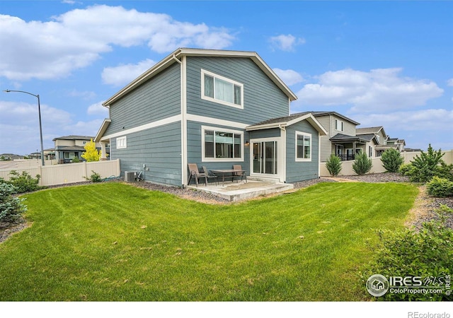 3960 Sweetgum St, Wellington, CO 80549 - back of property featuring a patio area and central AC