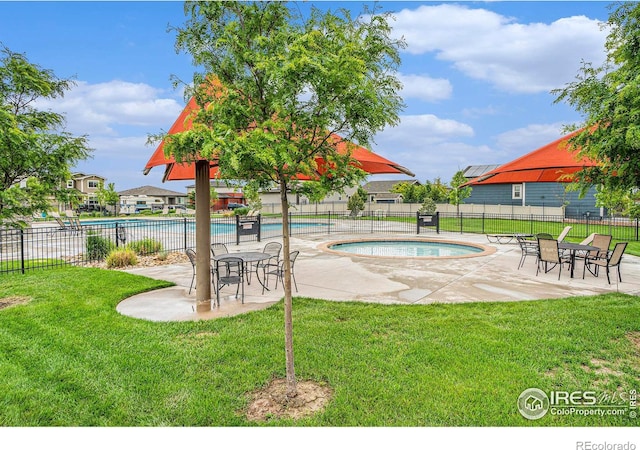 3960 Sweetgum St, Wellington, CO 80549 - community pool featuring a patio area