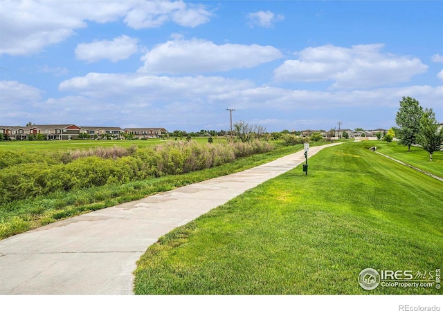 3960 Sweetgum St, Wellington, CO 80549 - view of community with a lawn