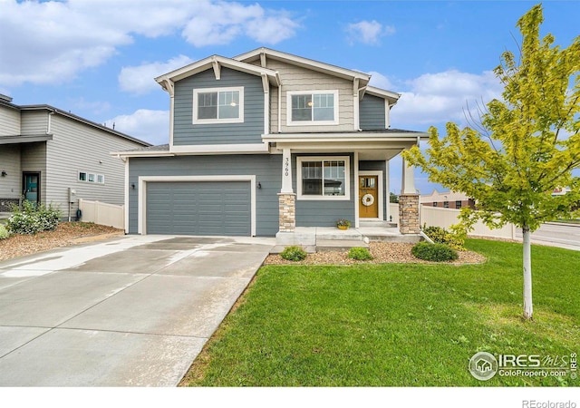 3960 Sweetgum St, Wellington, CO 80549 - craftsman-style home with a garage, covered porch, concrete driveway, and stone siding
