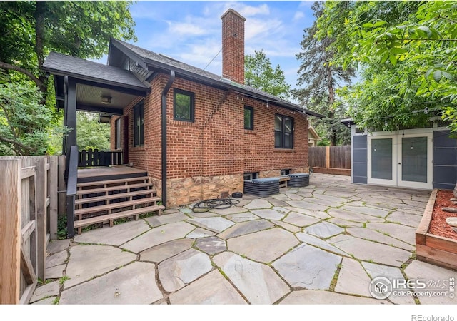 1010 Euclid Ave, Boulder, CO 80302 - fenced backyard featuring a patio and french doors