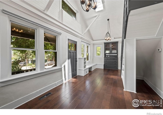 1010 Euclid Ave, Boulder, CO 80302 - foyer with a chandelier, dark wood finished floors, and high vaulted ceiling