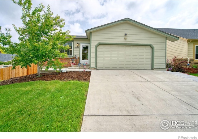 10940 Utica Ct, Westminster, CO 80031 - single story home with an attached garage and concrete driveway