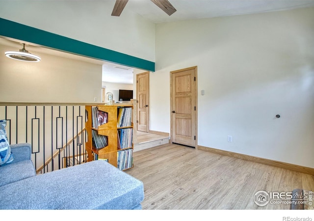 10940 Utica Ct, Westminster, CO 80031 - bedroom featuring wood finished floors, baseboards, high vaulted ceiling, and ceiling fan