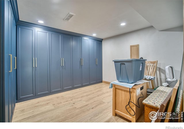 10940 Utica Ct, Westminster, CO 80031 - home office featuring light wood-type flooring, recessed lighting, and baseboards