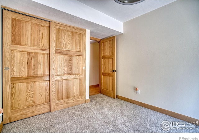 10940 Utica Ct, Westminster, CO 80031 - unfurnished bedroom with carpet flooring and baseboards