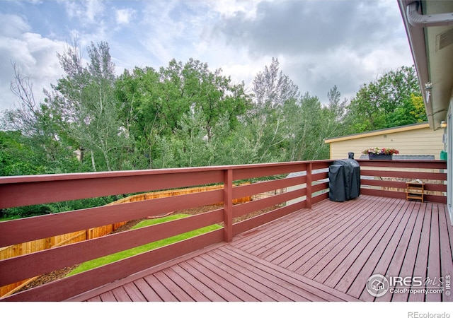 10940 Utica Ct, Westminster, CO 80031 - wooden terrace with grilling area