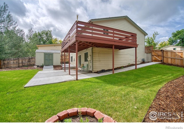 10940 Utica Ct, Westminster, CO 80031 - back of house with a deck, a patio area, and a gate