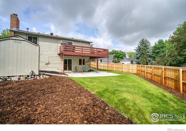 10940 Utica Ct, Westminster, CO 80031 - rear view of house featuring a patio, a deck, and a chimney