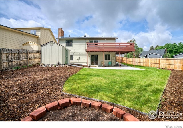10940 Utica Ct, Westminster, CO 80031 - back of property with a patio, a deck, and a chimney