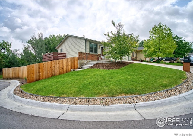10940 Utica Ct, Westminster, CO 80031 - view of front of house with brick siding and curved driveway