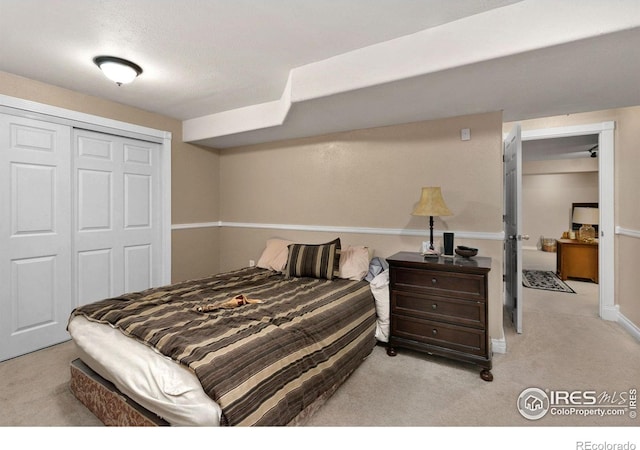 1421 Snipe Ln, Fort Collins, CO 80524 - bedroom with light carpet, a closet, and baseboards