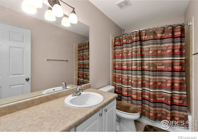 1421 Snipe Ln, Fort Collins, CO 80524 - bathroom with toilet, vanity, tile patterned floors, and a shower with curtain