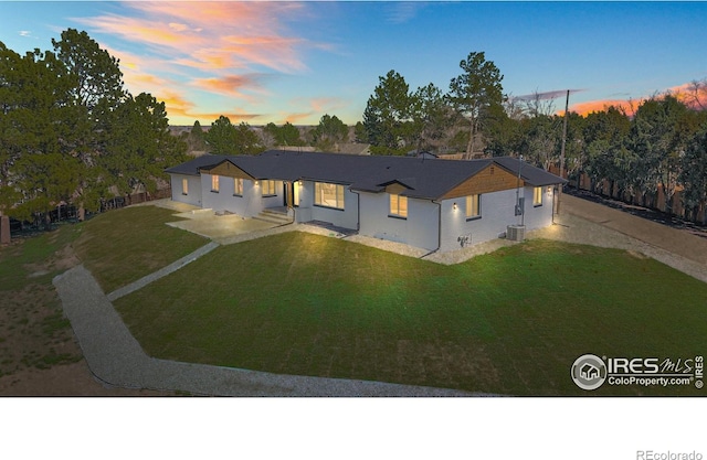 6766 Zenobia Loop, Westminster, CO 80030 - single story home featuring concrete driveway, a yard, and cooling unit