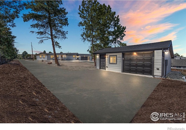 6766 Zenobia Loop, Westminster, CO 80030 - single story home featuring asphalt driveway and an outbuilding