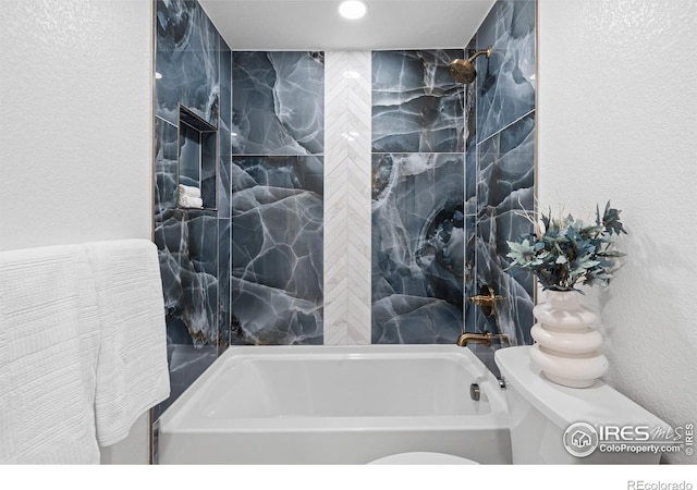 6766 Zenobia Loop, Westminster, CO 80030 - bathroom with recessed lighting and shower / washtub combination