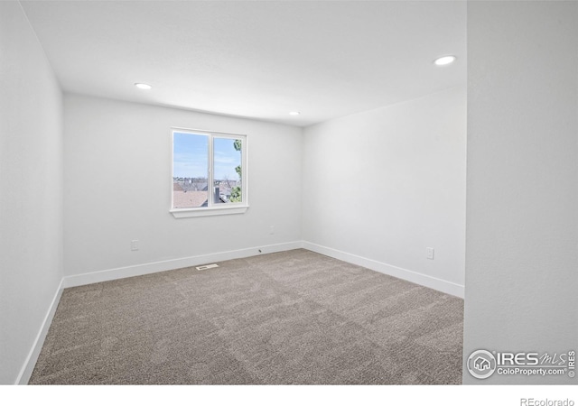 6766 Zenobia Loop, Westminster, CO 80030 - carpeted empty room with recessed lighting and baseboards