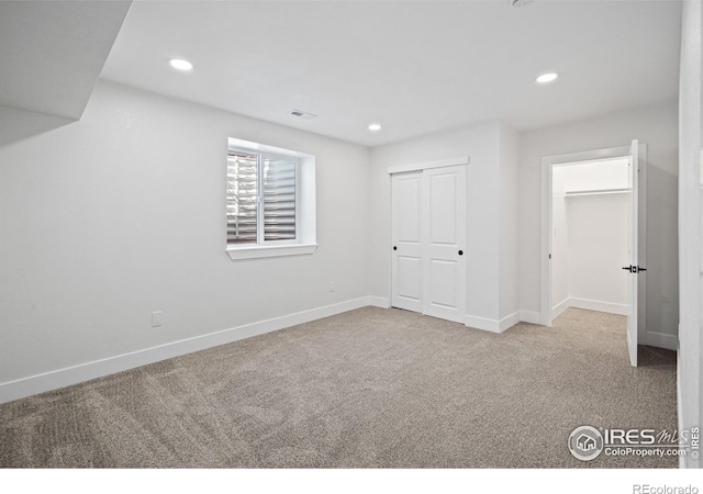 6766 Zenobia Loop, Westminster, CO 80030 - unfurnished bedroom with carpet floors, recessed lighting, baseboards, and a closet