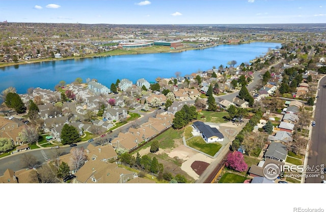 6766 Zenobia Loop, Westminster, CO 80030 - aerial view of property and surrounding area featuring nearby suburban area and a large body of water