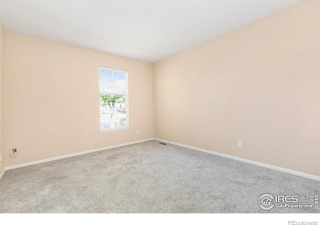 3180 Springfield Dr, Loveland, CO 80538 - carpeted empty room featuring baseboards