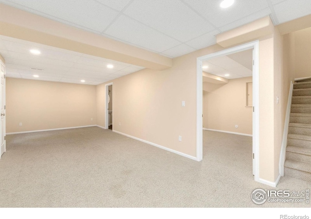 3180 Springfield Dr, Loveland, CO 80538 - finished below grade area featuring stairway, recessed lighting, carpet flooring, a drop ceiling, and baseboards