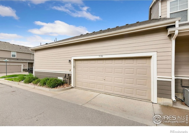 3180 Springfield Dr, Loveland, CO 80538 - garage with concrete driveway