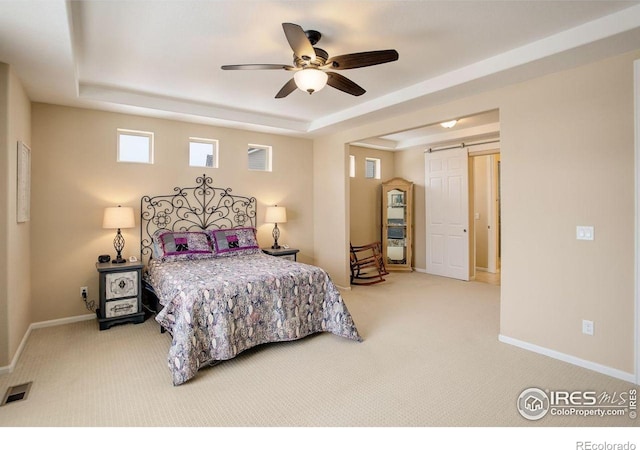 1060 Arrowhead Ct, Erie, CO 80516 - carpeted bedroom featuring a raised ceiling, baseboards, and ceiling fan