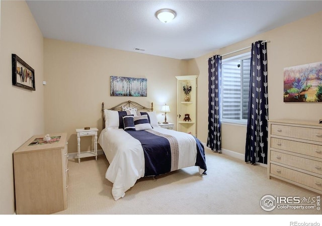 1060 Arrowhead Ct, Erie, CO 80516 - bedroom with light colored carpet and baseboards