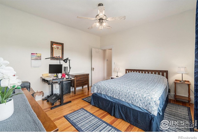 6009 W 28th St W, Greeley, CO 80634 - bedroom with wood finished floors and an office area