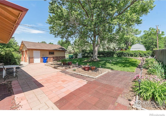 6009 W 28th St W, Greeley, CO 80634 - fenced backyard with a patio area and an outbuilding