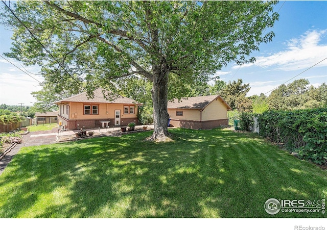 6009 W 28th St W, Greeley, CO 80634 - view of yard featuring a patio area