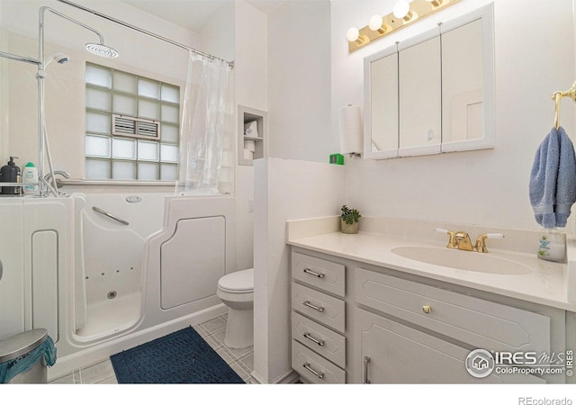 6009 W 28th St W, Greeley, CO 80634 - full bath featuring vanity, a tub with jets, and a shower with shower curtain