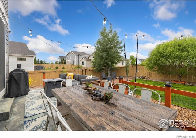 6757 Sage Meadows Dr, Wellington, CO 80549 - wooden deck featuring outdoor dining space and area for grilling