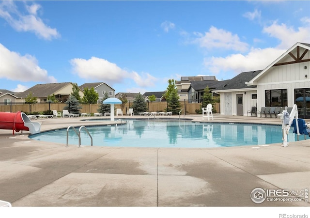 6757 Sage Meadows Dr, Wellington, CO 80549 - community pool with a patio and a water slide