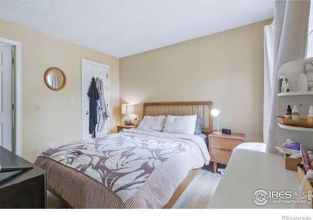 6076 Gunbarrel Ave Unit F, Boulder, CO 80301 - bedroom featuring wood finished floors