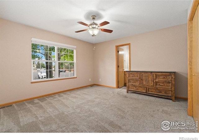 3816 Partridge Ct, Evans, CO 80620 - unfurnished bedroom with baseboards, carpet flooring, and ceiling fan